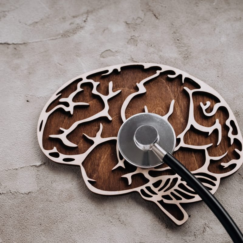 A stethoscope and brain close-up. Awareness of Alzheimer's, Parkinson's disease, dementia, stroke, seizure or mental health